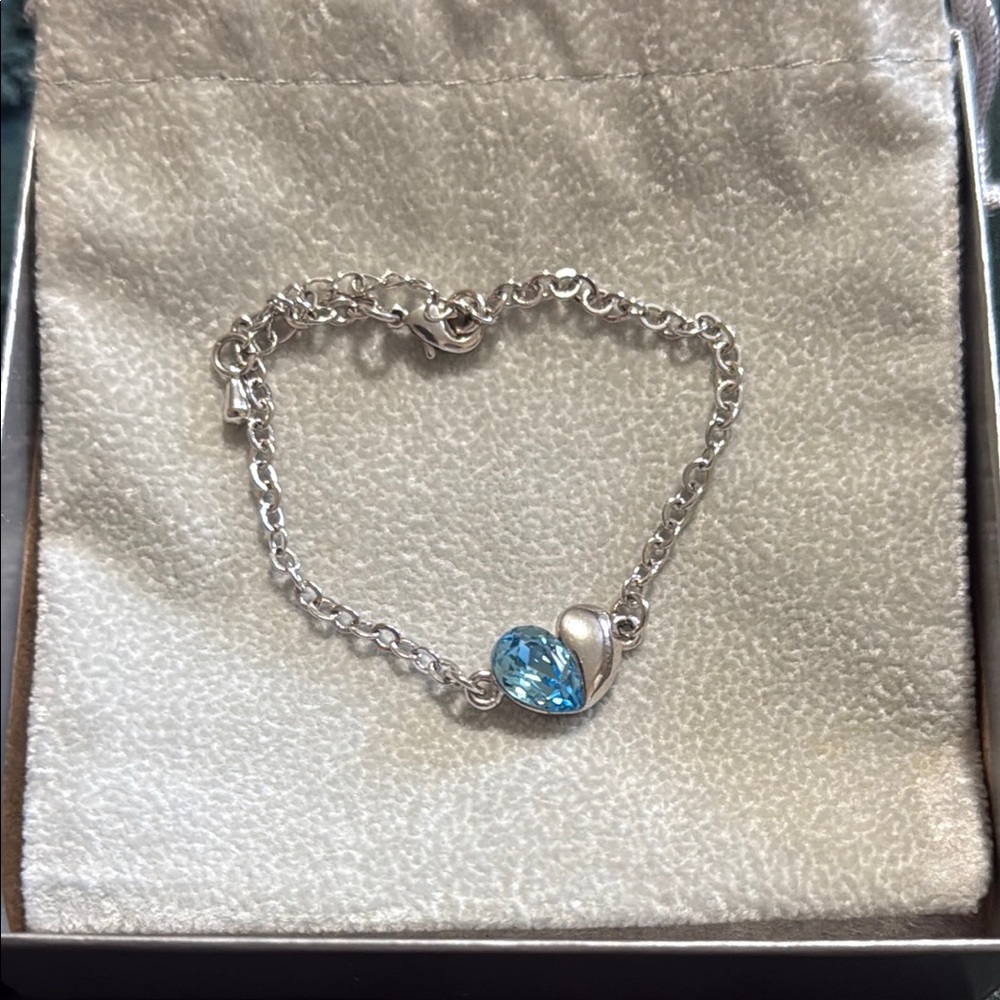 Elegant Silver Heart Bracelet with Blue Gemstone